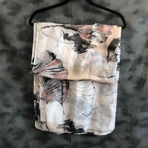 Floral patterned wrap around scarf.